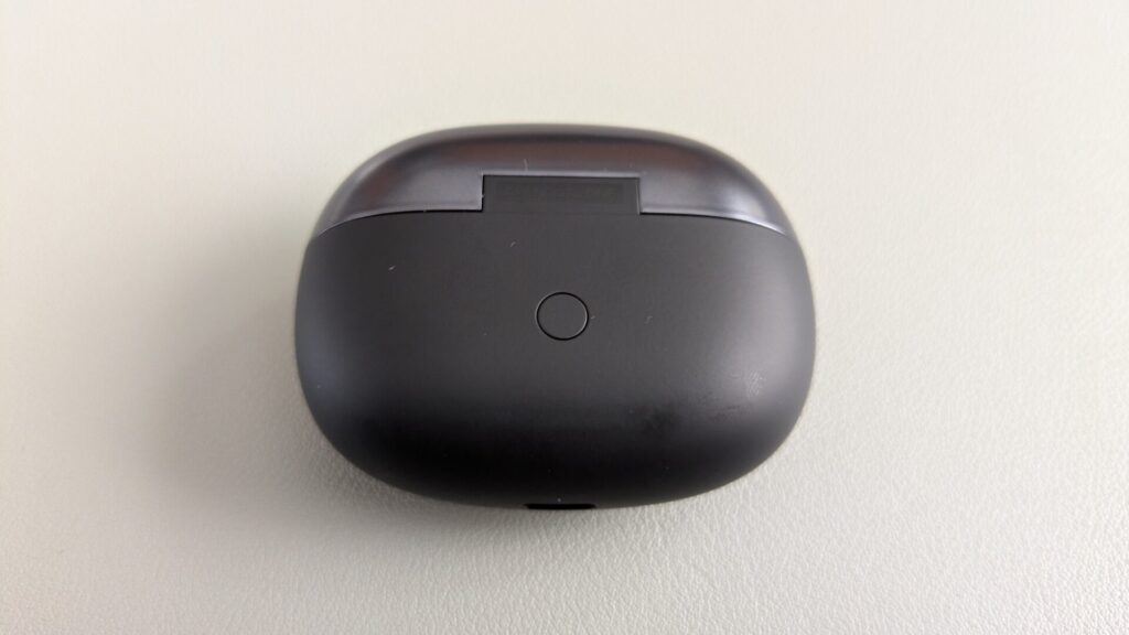 shokz-opendots-one-charing-case-button