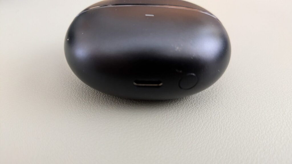 qcy-melobuds-n70-charging-case-button